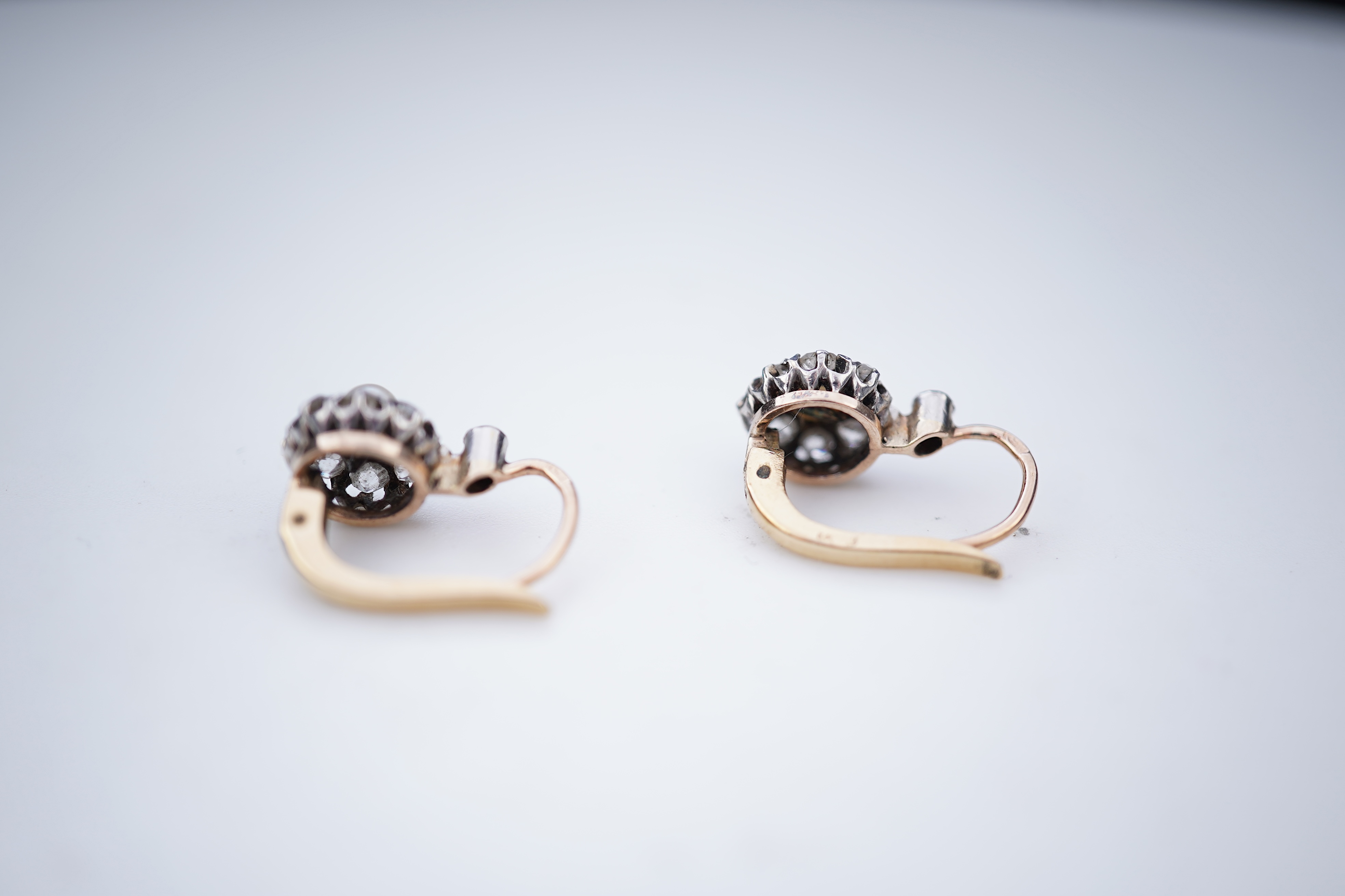 A pair of pearl and diamond earrings, early 20th century